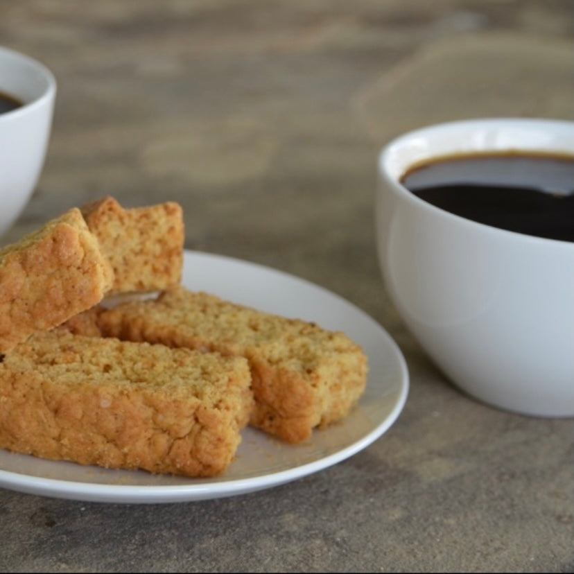 plate-of-buttermilk-rusks-next-to-expresso